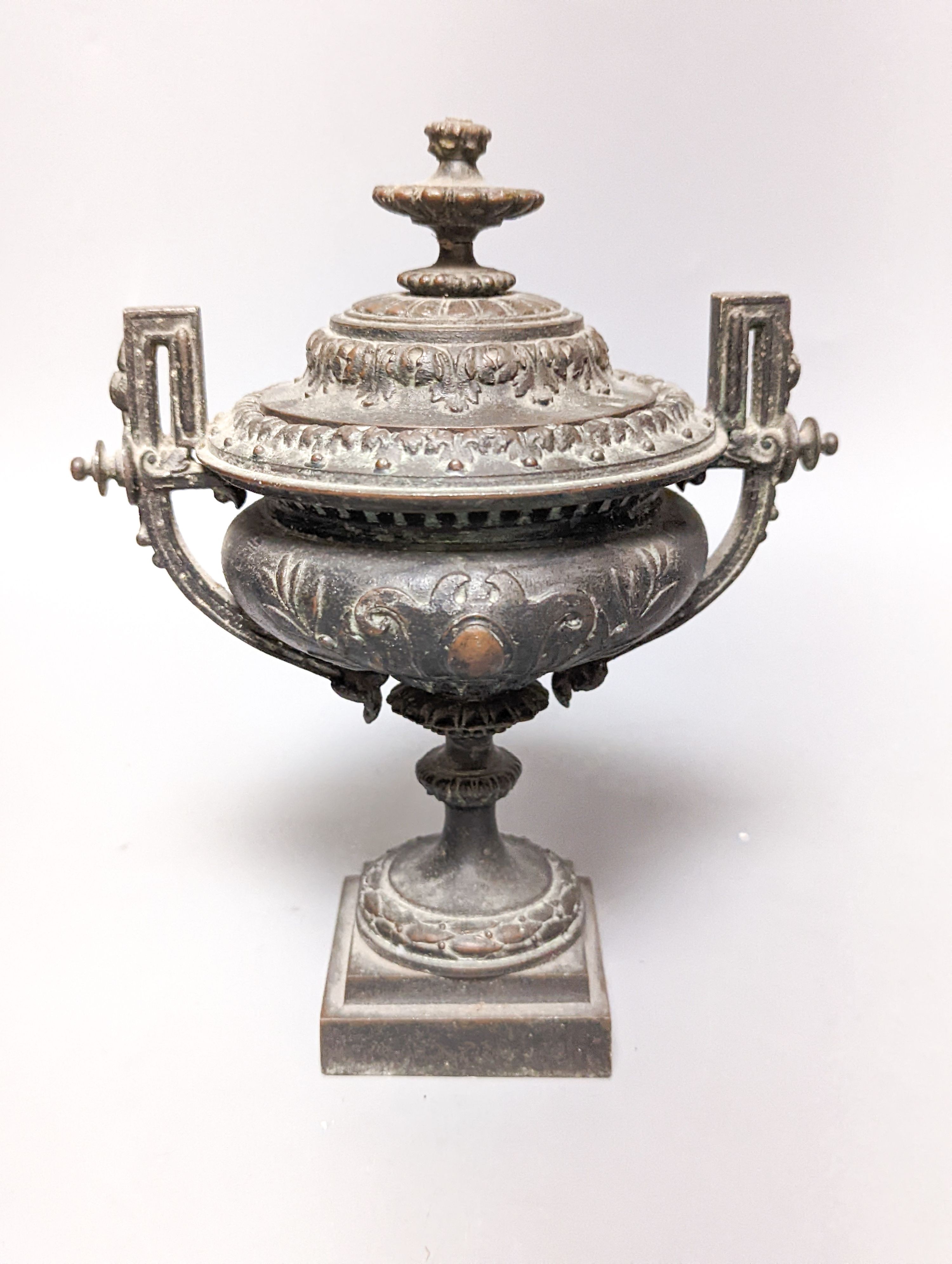 A pair of bronze tazzas on architectural slate bases, c.1900, together with a third, associated piece (3) 25cm